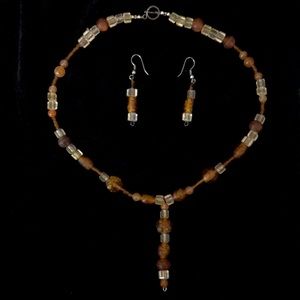 Pretty amber coloured beaded necklace and earrings